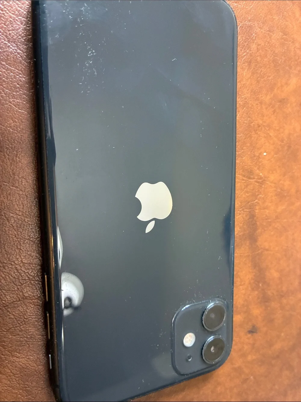 Apple Black iPhone with Dual Rear Cameras and Silver Logo